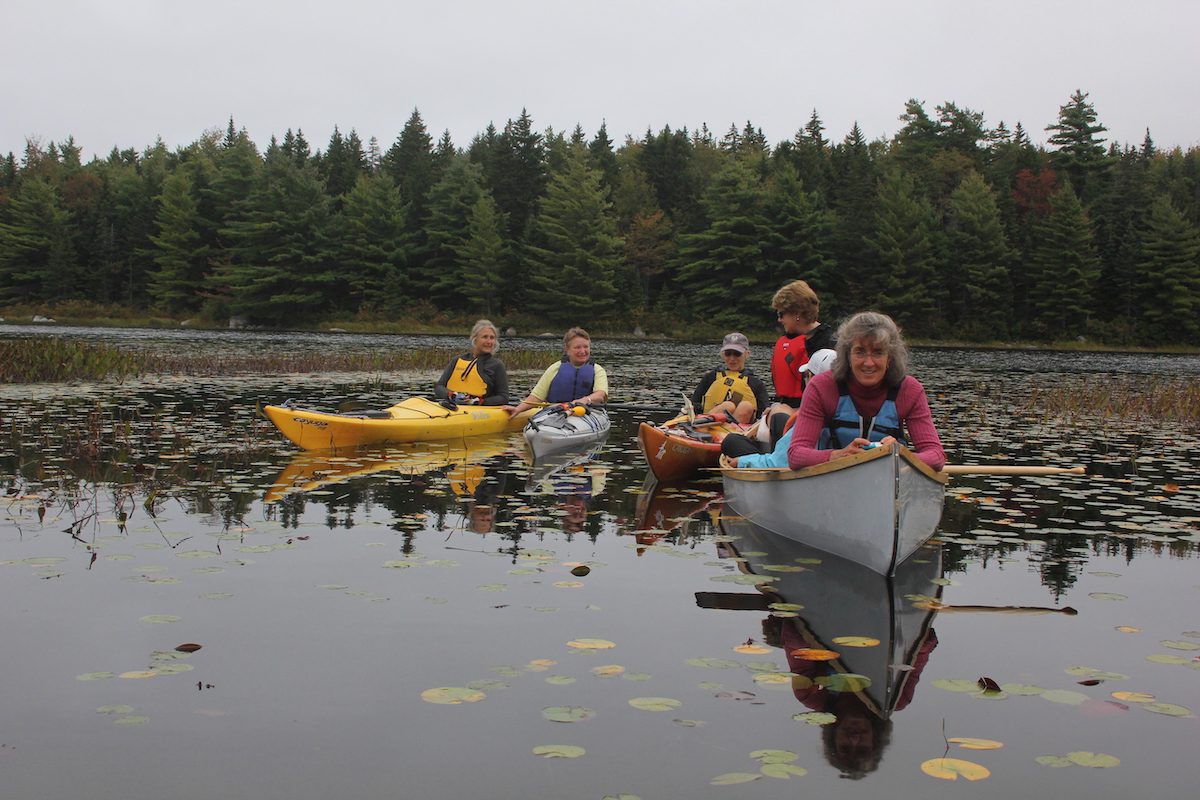 A group of women paddling in Nova Scotia