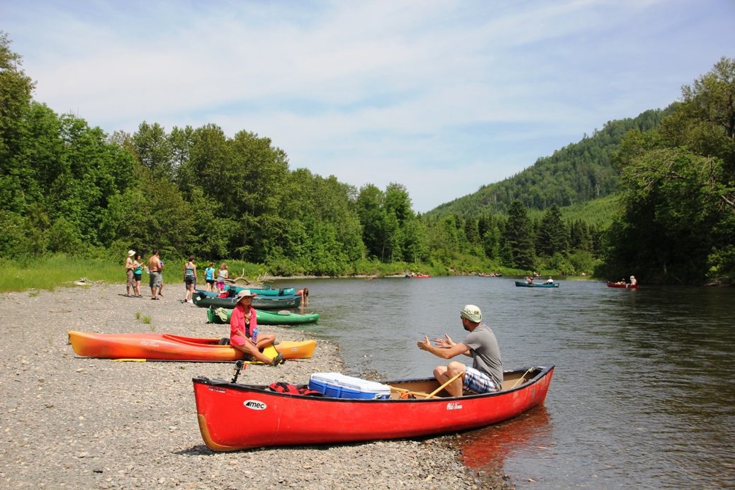 Taking a break while paddling down the Green River in New Brunswick