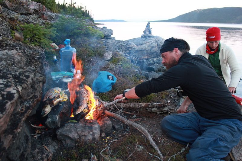 Fireside dinner by the river in Rigolet, Labrador