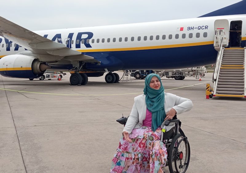 Tanzila Khan next to a Ryan Air plane