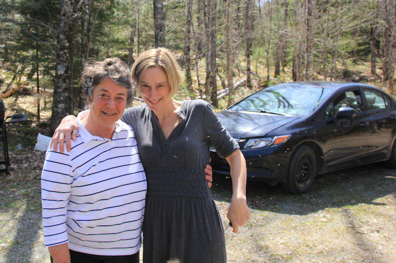 Melanie and Sandra in a swarm of flies just before Melanie heads back to Ontario, after learning how to slow travel at home