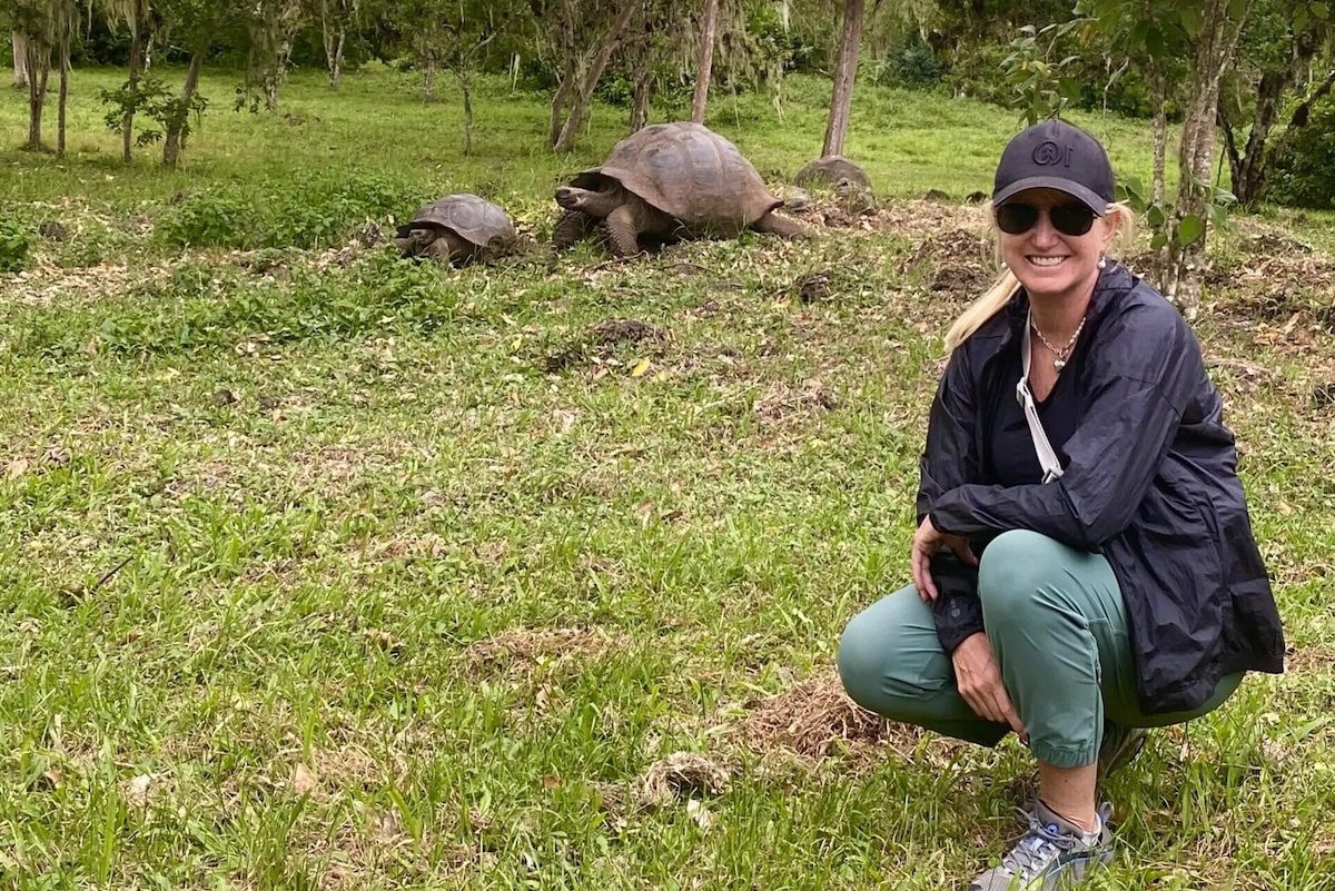 Galapagos Ecuador Intrepid Carolyn with giant tortoises