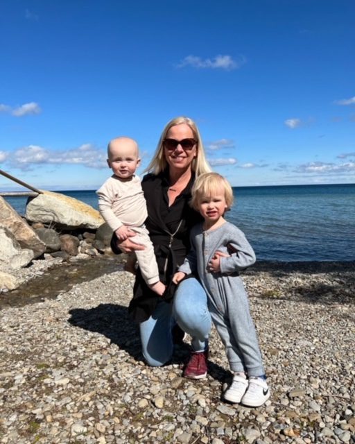 Kathy with her grandsons Cam and Owen on Georgian Bay