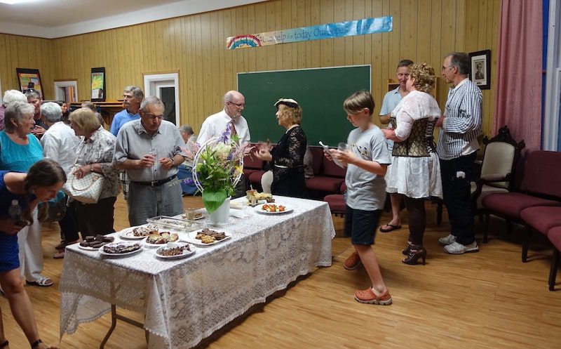 A reception for the musicians and concert goers is hosted by volunteers after the performance.