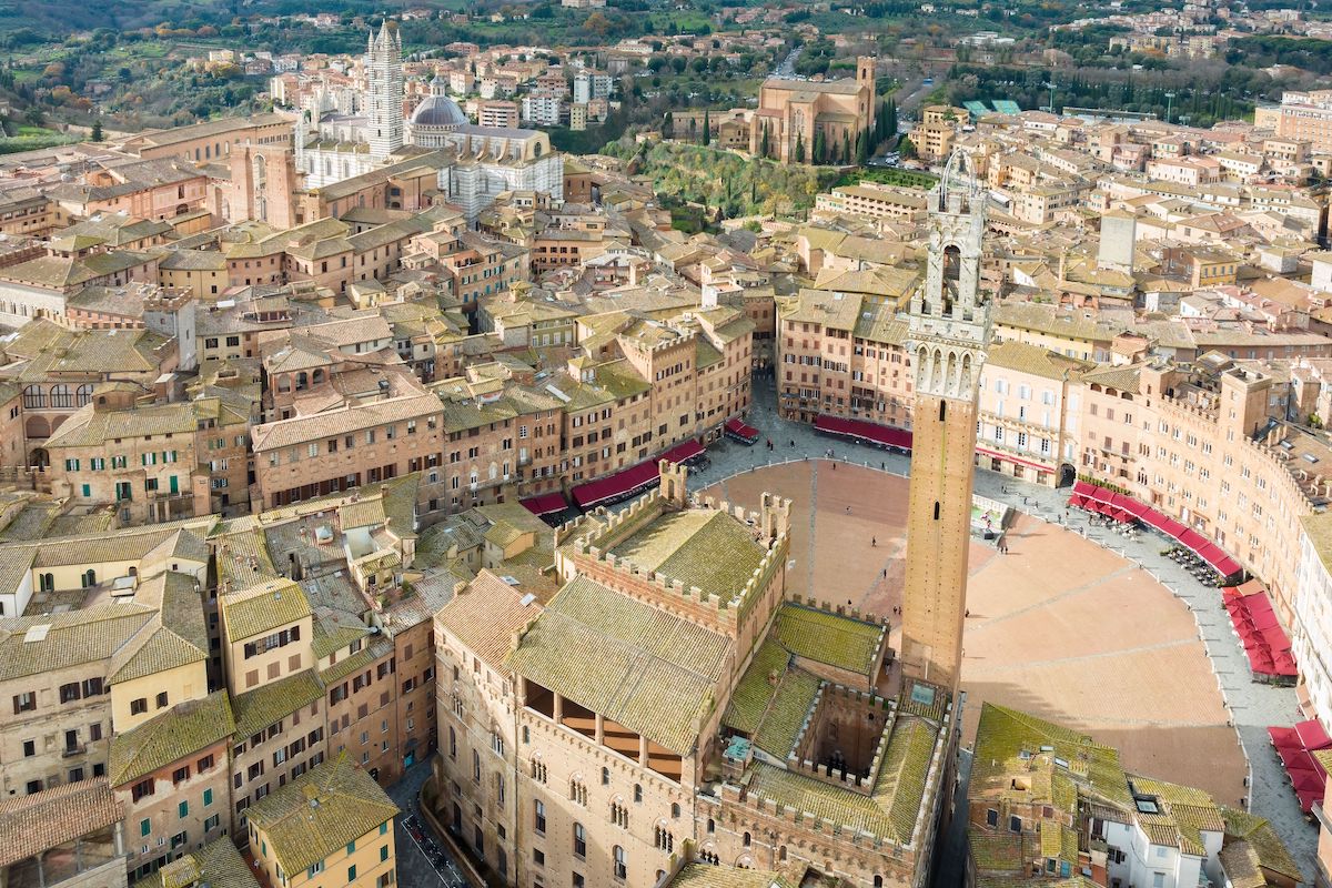 An aerial view of Siena cityscape surrounded by buildings, one of many day trips from Florence to take.