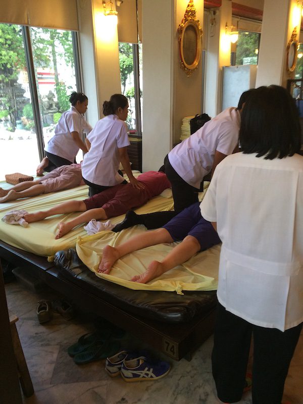 Women enjoy a traditional Thai massage in Bangkok