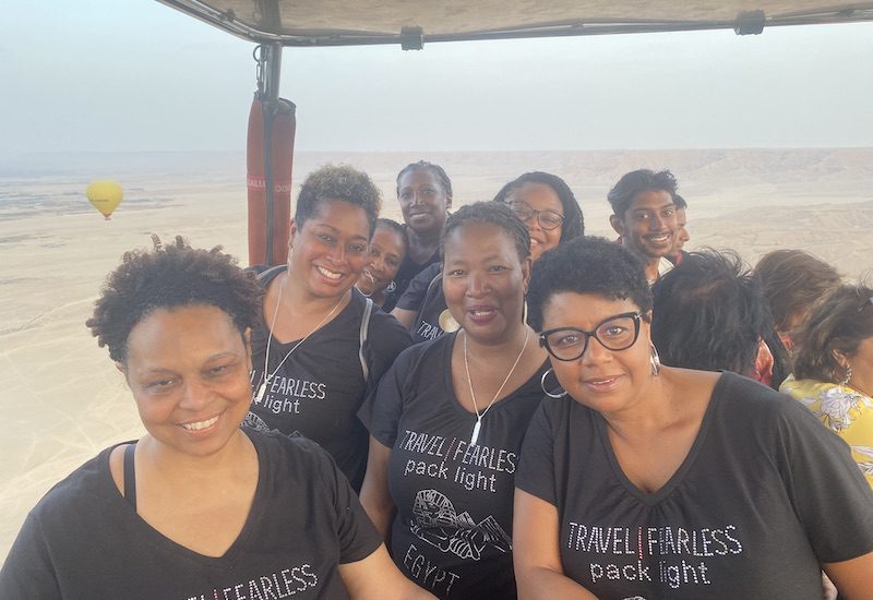 Women traveling with Dawn Booker and Packlight Global on a hot air balloon ride in Egypt