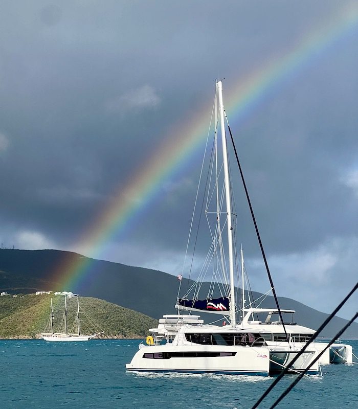 A rainbow over a catamaran in the British Virgin Islands