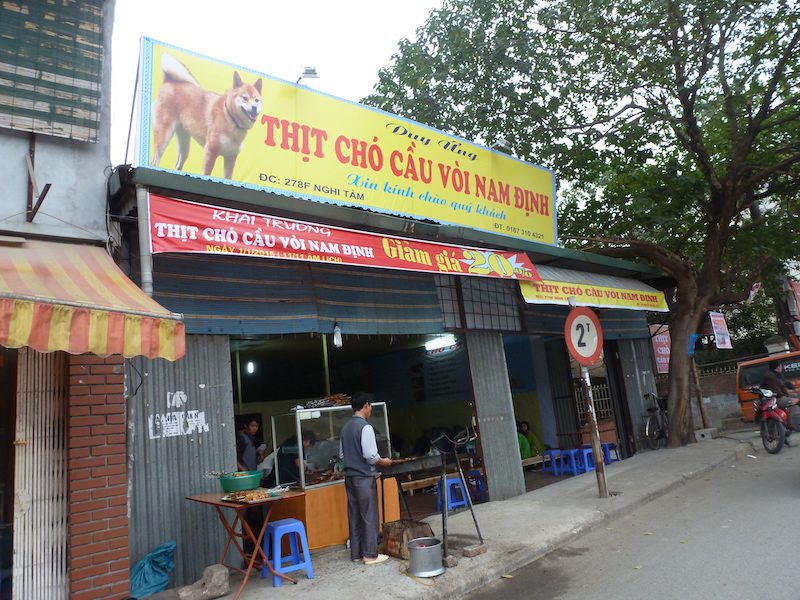 A restaurant in Vietnam advertising dog meat being sold.