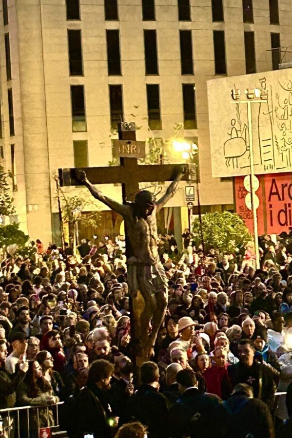 Carrying a cross in Barcelona spain holy week