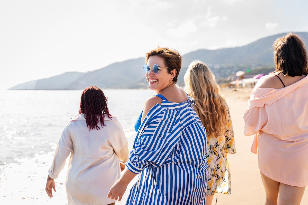 A group of women enjoying the beach on a women-only tour