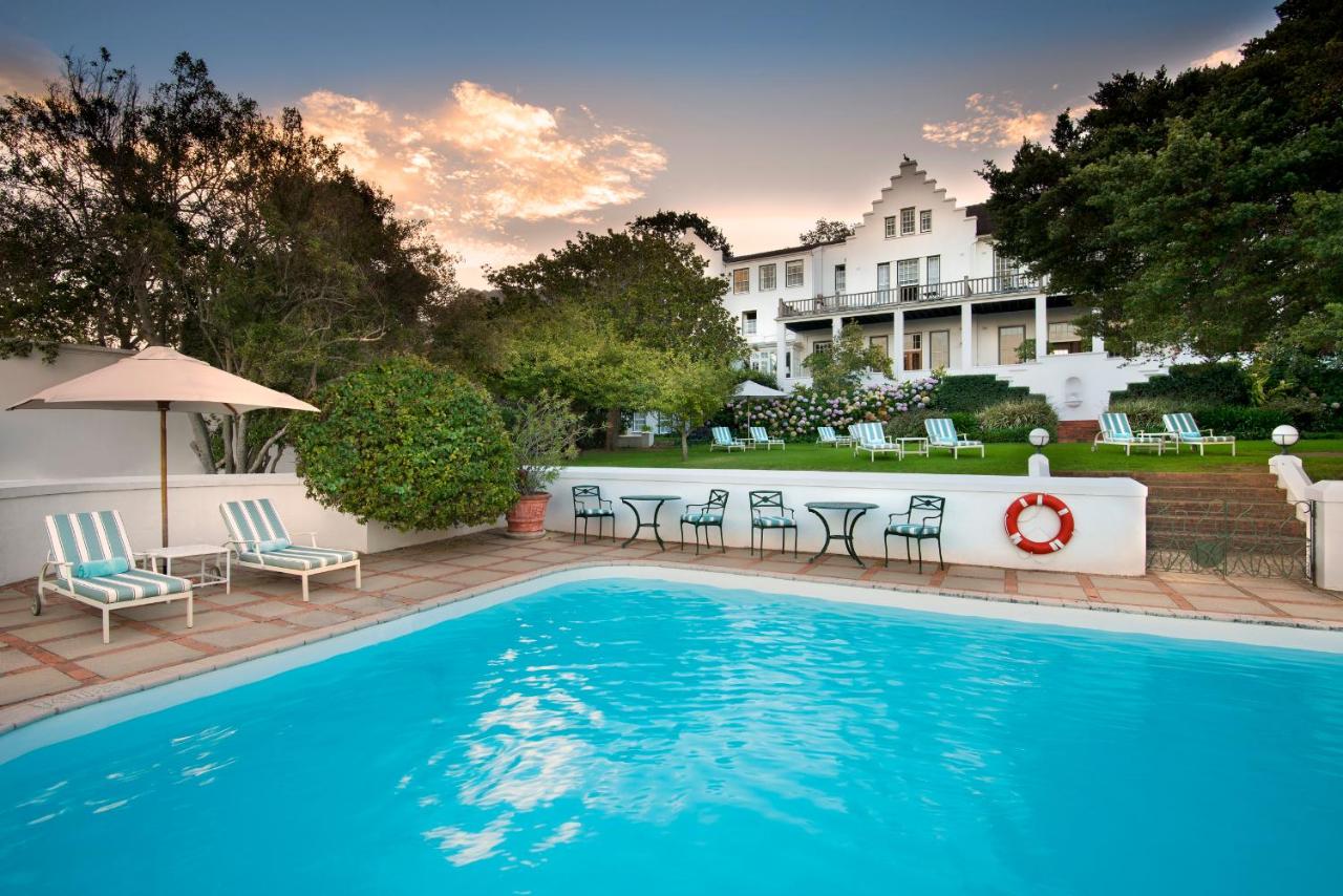 A view of the pool and grounds of the Cellars Hohenort Hotel in Cape Town, South Africa, recommended by a JourneyWoman reader as a safe place for women to stay. 