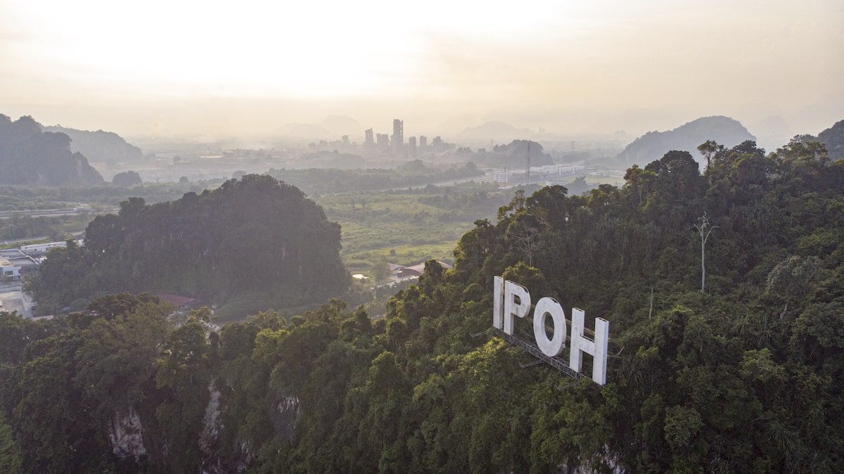 Aerial view of ‘IPOH’ landmark on a limestone mountain in Ipoh city, Malaysia
