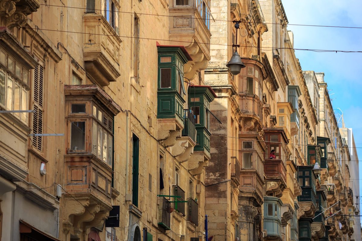 Traditional sandstone buildings line the streets of Valletta, a city in Malta the Mediterranean island