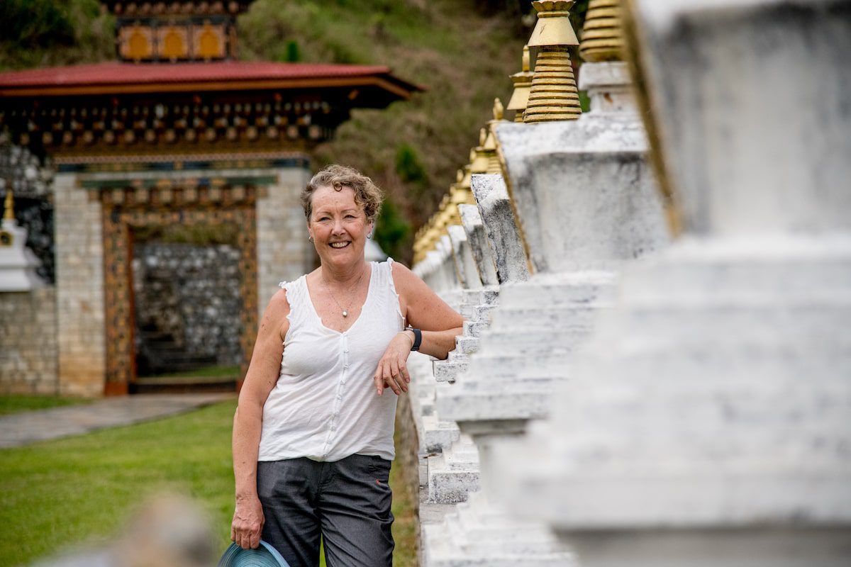 A woman in Bhutan on an adventure travel tour with Wild Woman Expeditions