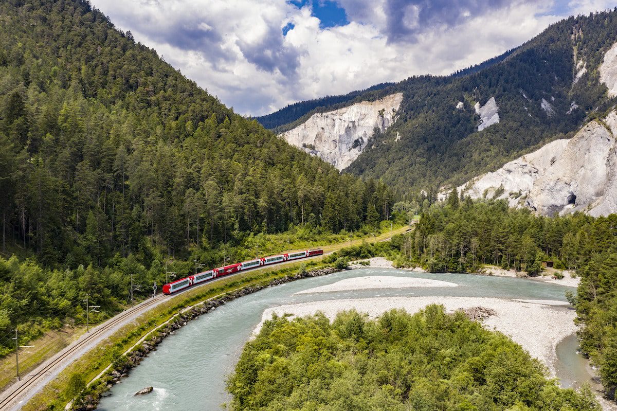 Glacier Express Train travelling through the Rhine Gorge in Switzerland