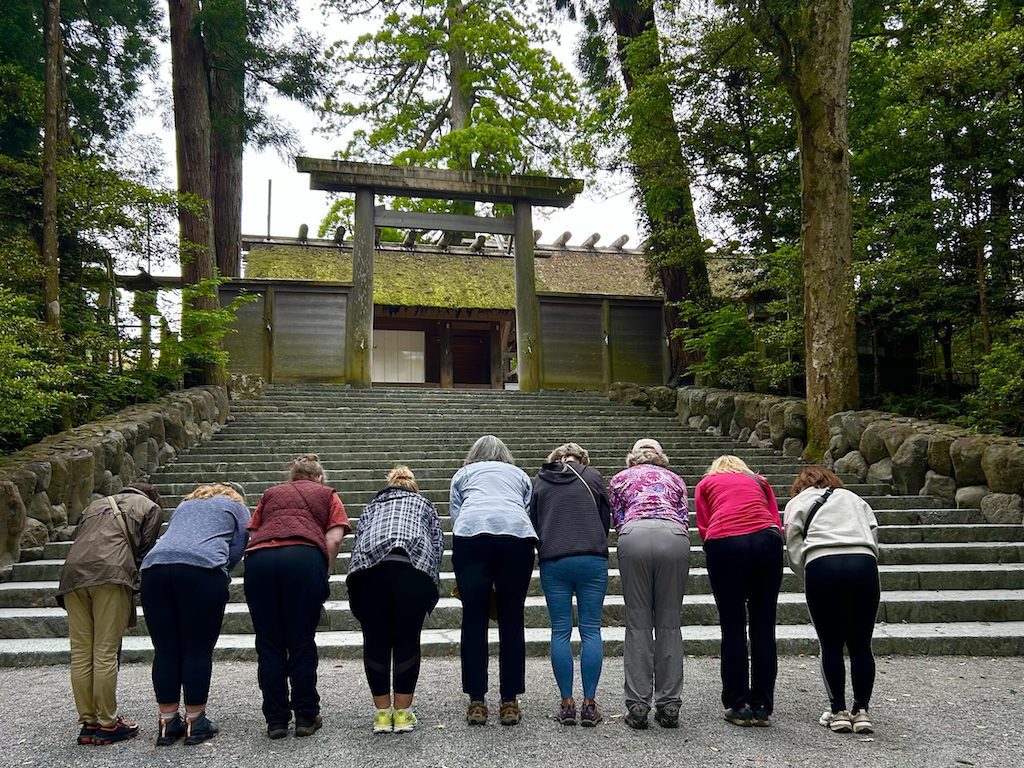 Bowing at the Shinto Grand Shrine of Ise, dedicated to the solar goddess Amaterasu