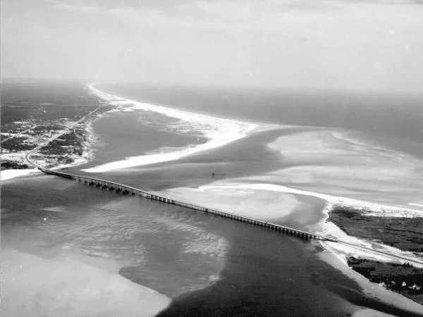 An aerial view of the Destin bridge, East Pass, Harbor and city. 1959. [ FLORIDA MEMORY / PUBLIC DOMAIN IMAGE ]