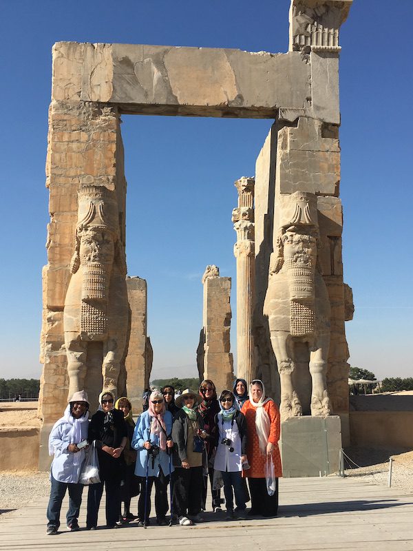 A group of women in front of Iran's Persepolis