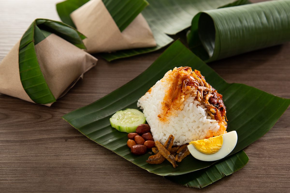 Nasi lemak packed in banana leaf, popular in Malaysia's breakfast culture