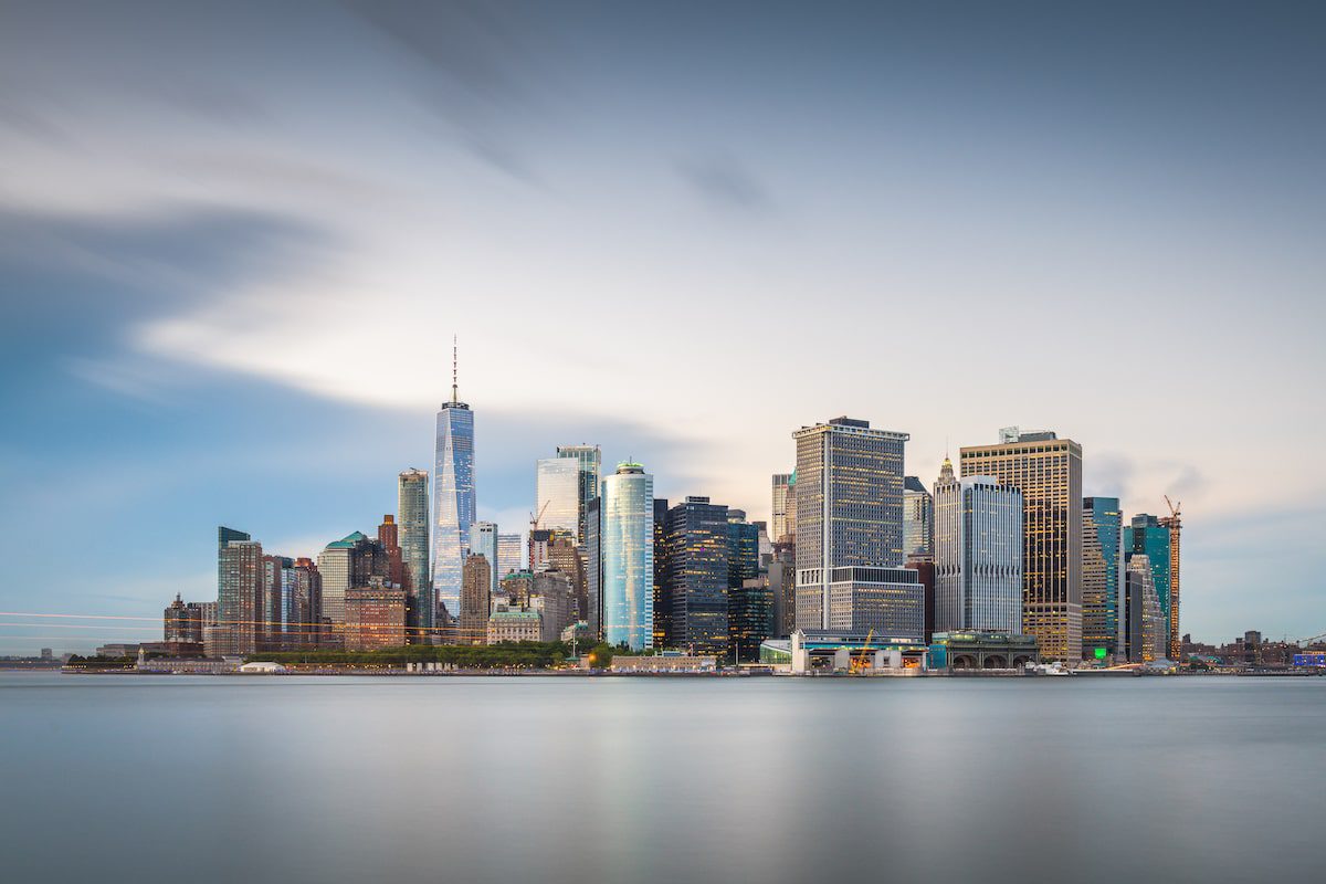 New York, New York, USA skyline on the bay at twilight from Governor's Island.