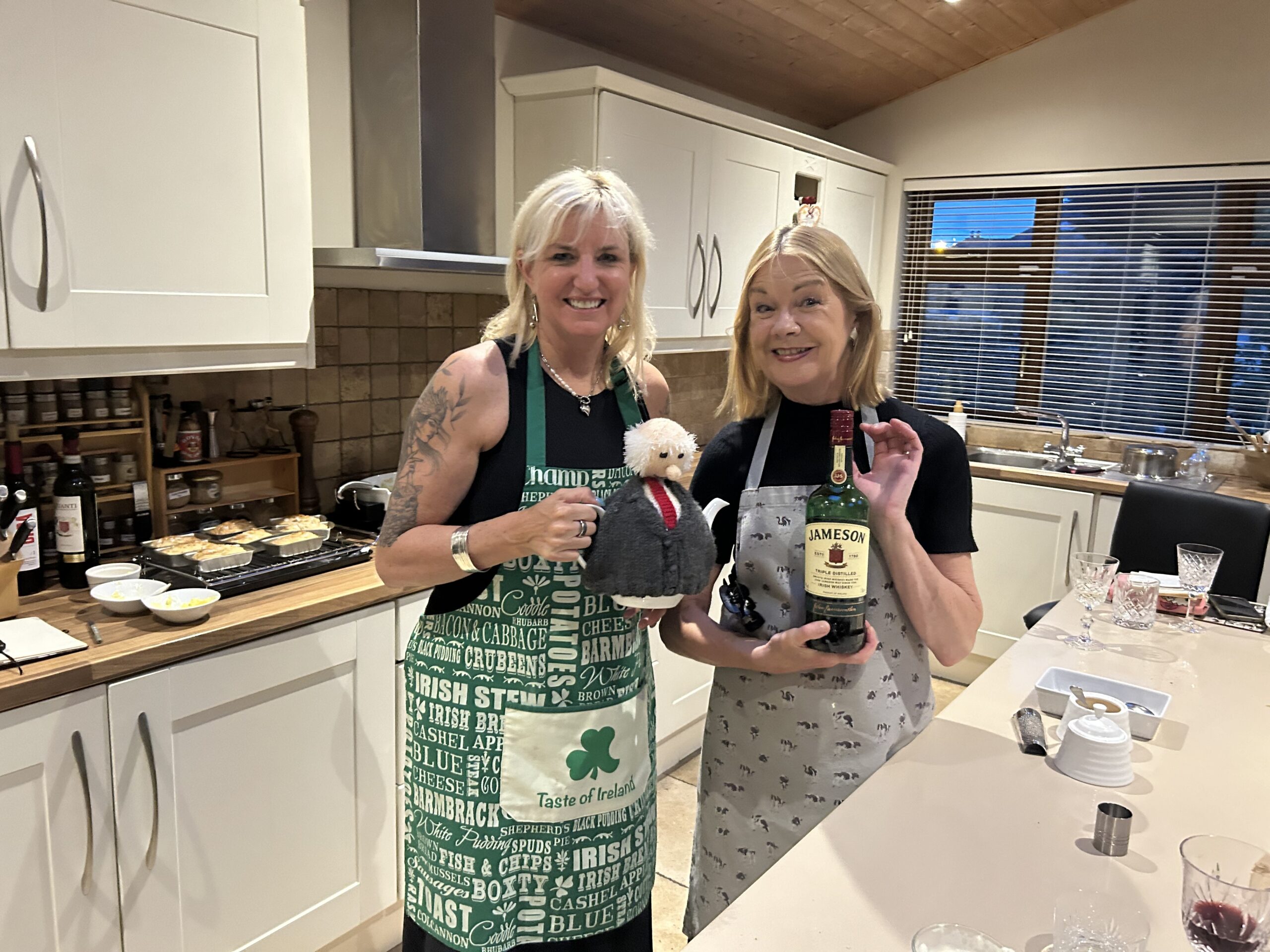 two women smiling in a kitchen at an Eatwith experience in Dublin Ireland