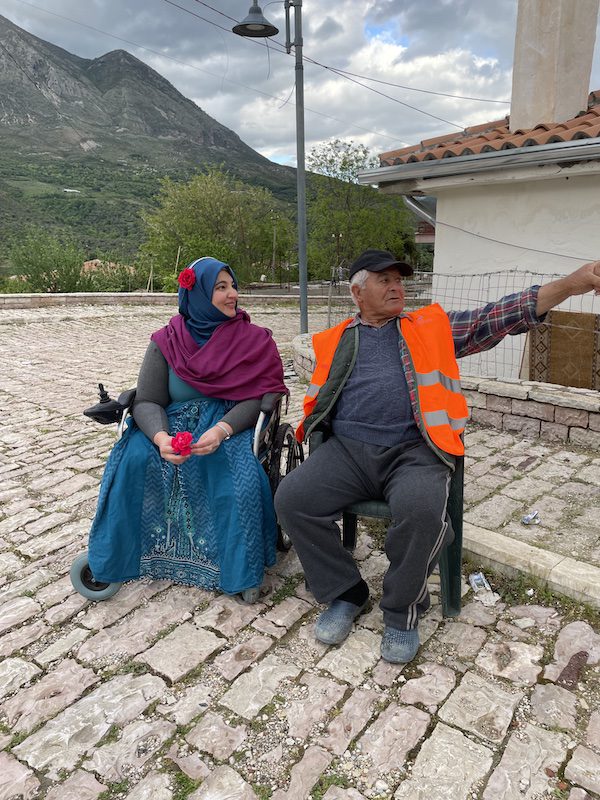 Tanzila Khan and Shazam, a local man in Tepelene Town, Albania