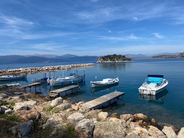 Stopping for a picnic and swim along the coast in Greece on a cycling trip.