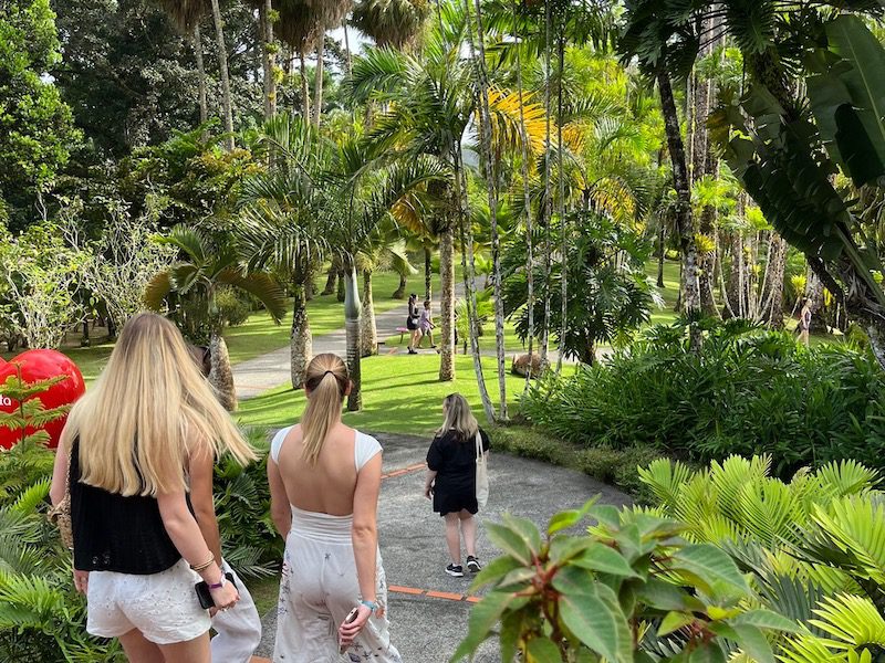 Women walking through Jardin de Balata in Martinique