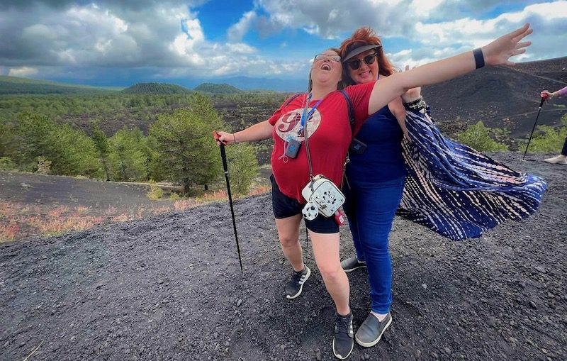 Two women having fun on a Sisterhood Travels group trip.