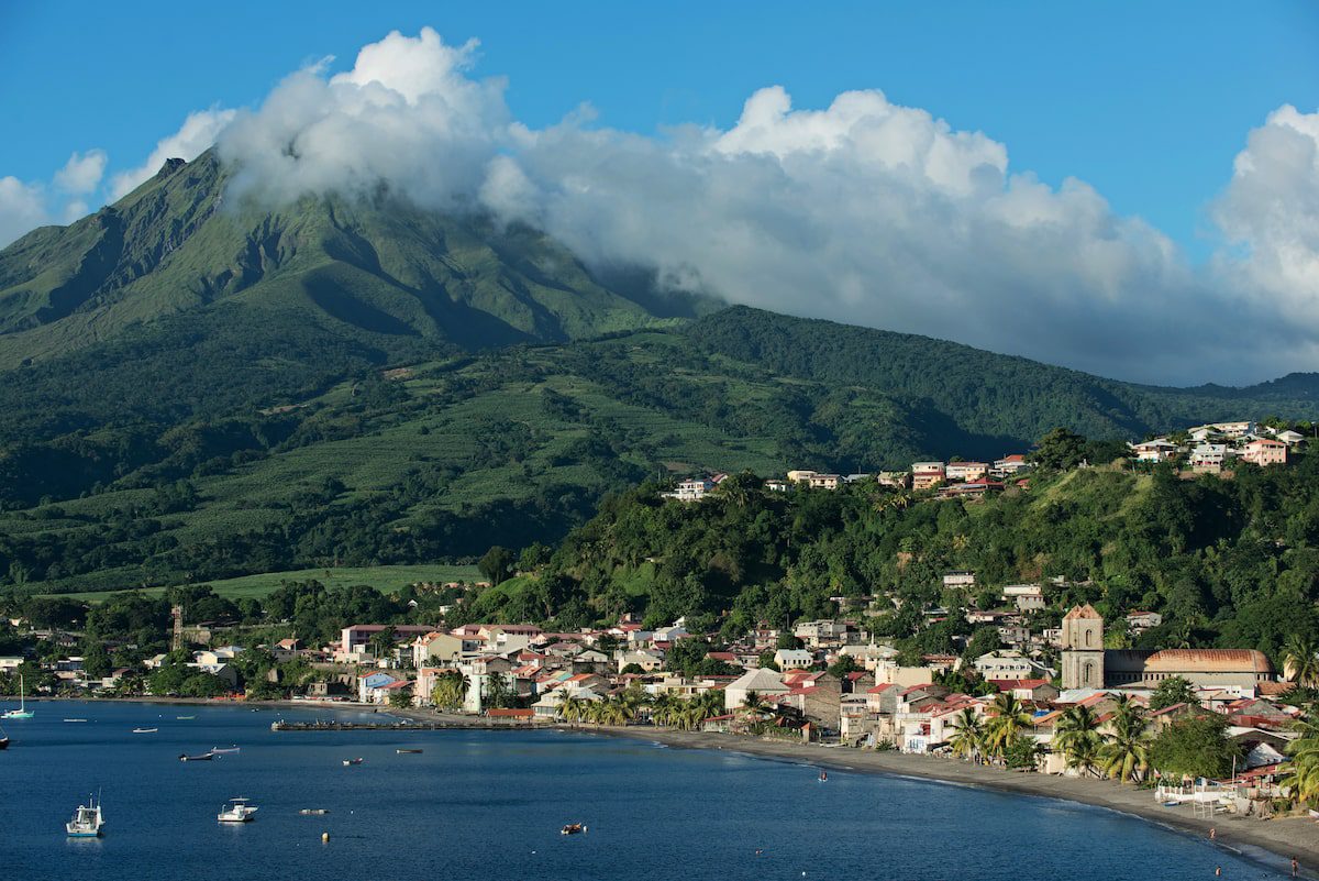 Views of Mount Pelee in Martinique and a seaside town