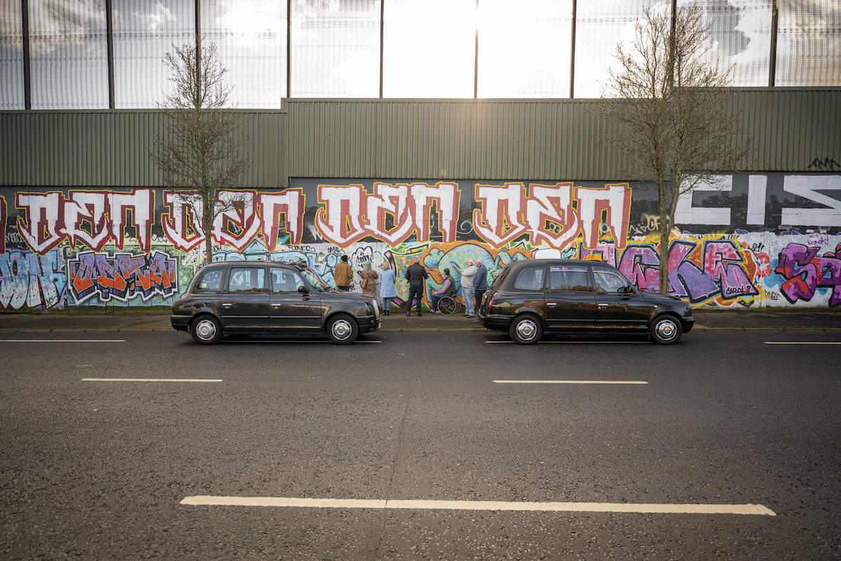 Touring Around Belfast gives visitors an insight into Belfast the city, its history, its murals and its people while driving the city in a classic black cab.