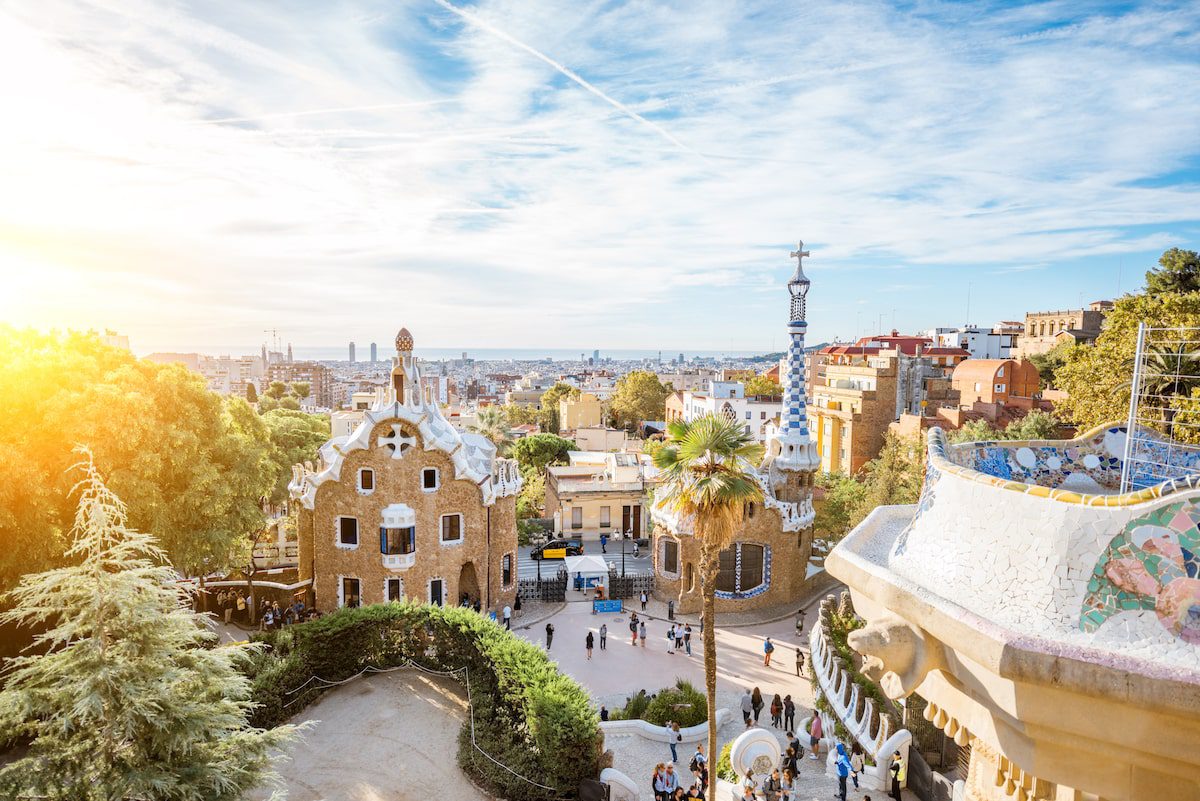 Cityscape view with colorful fairy buildings in the famous Guell park during the morning light in Barcelona