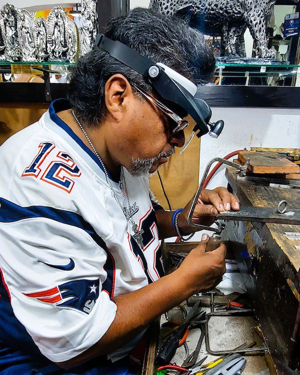 Taxco - Silversmith working