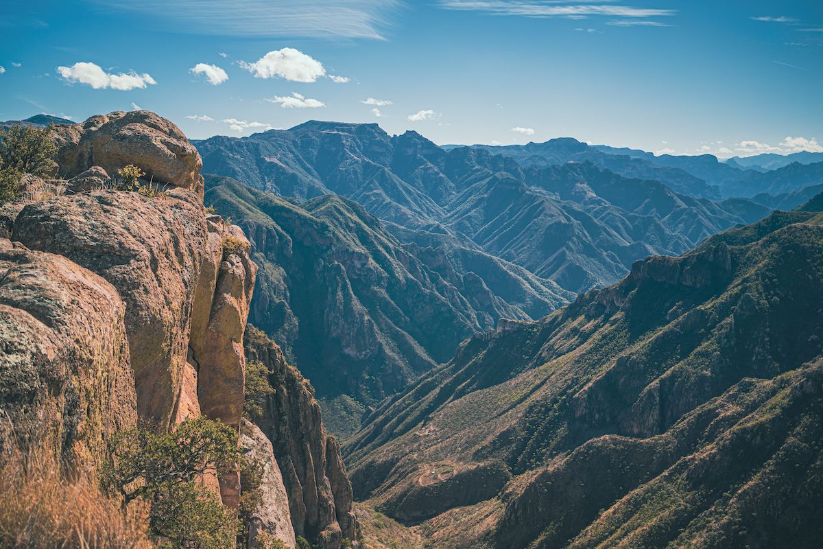 An aerial shot of Copper Canyon in Mexico with high and rocky mountains