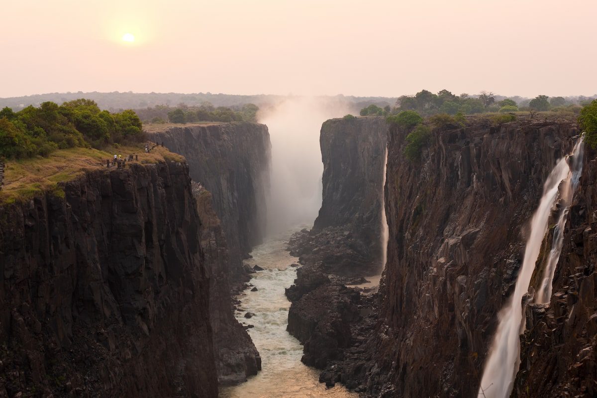 Victoria Falls, huge waterfalls of the Zambezi river flowing over sheer cliffs