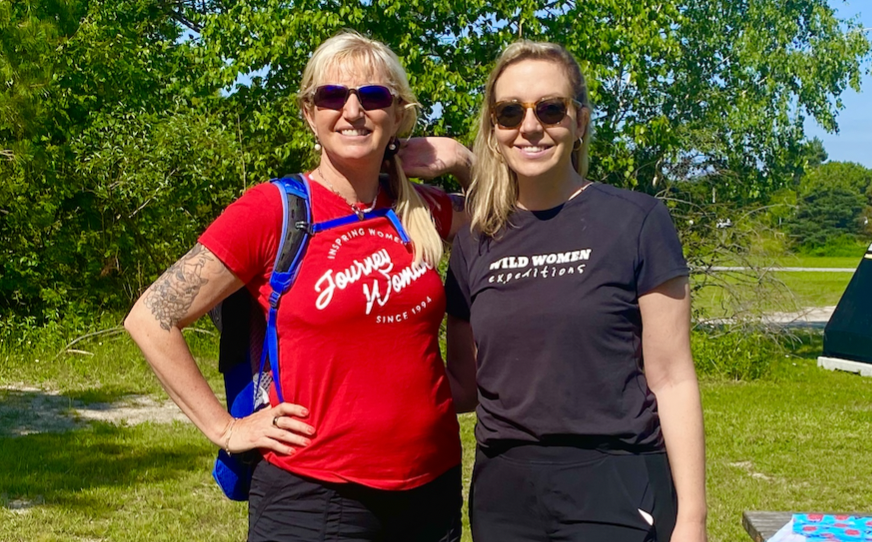 two women hiking for ally group fundation