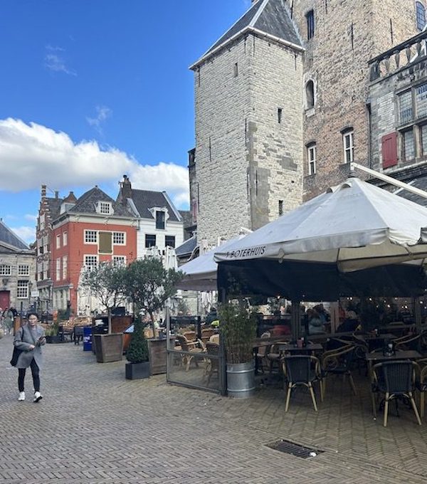 Delft’s Markt Square is a sunny place to meet and people watch