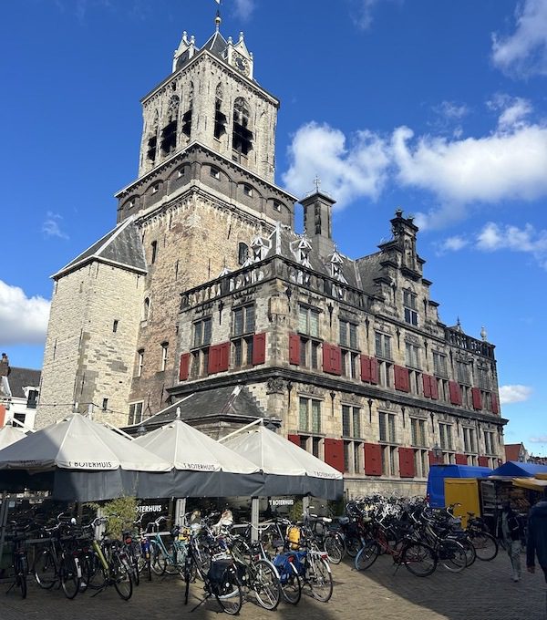 Delft’s red-shuttered historic city hall dates back to 1200 and was nearly destroyed during a fire in 1618