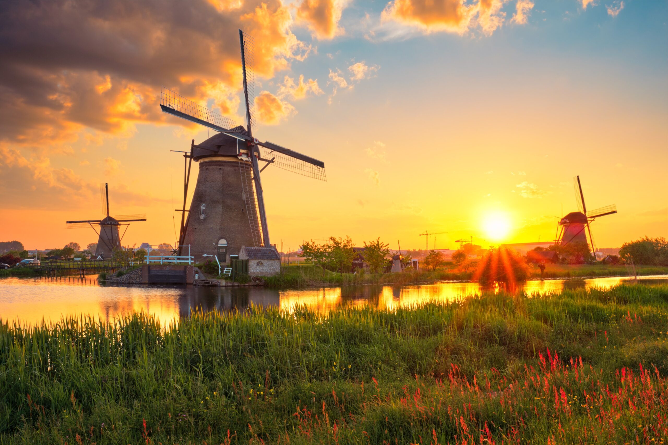 Netherlands rural landscape with windmills at famous tourist site Kinderdijk