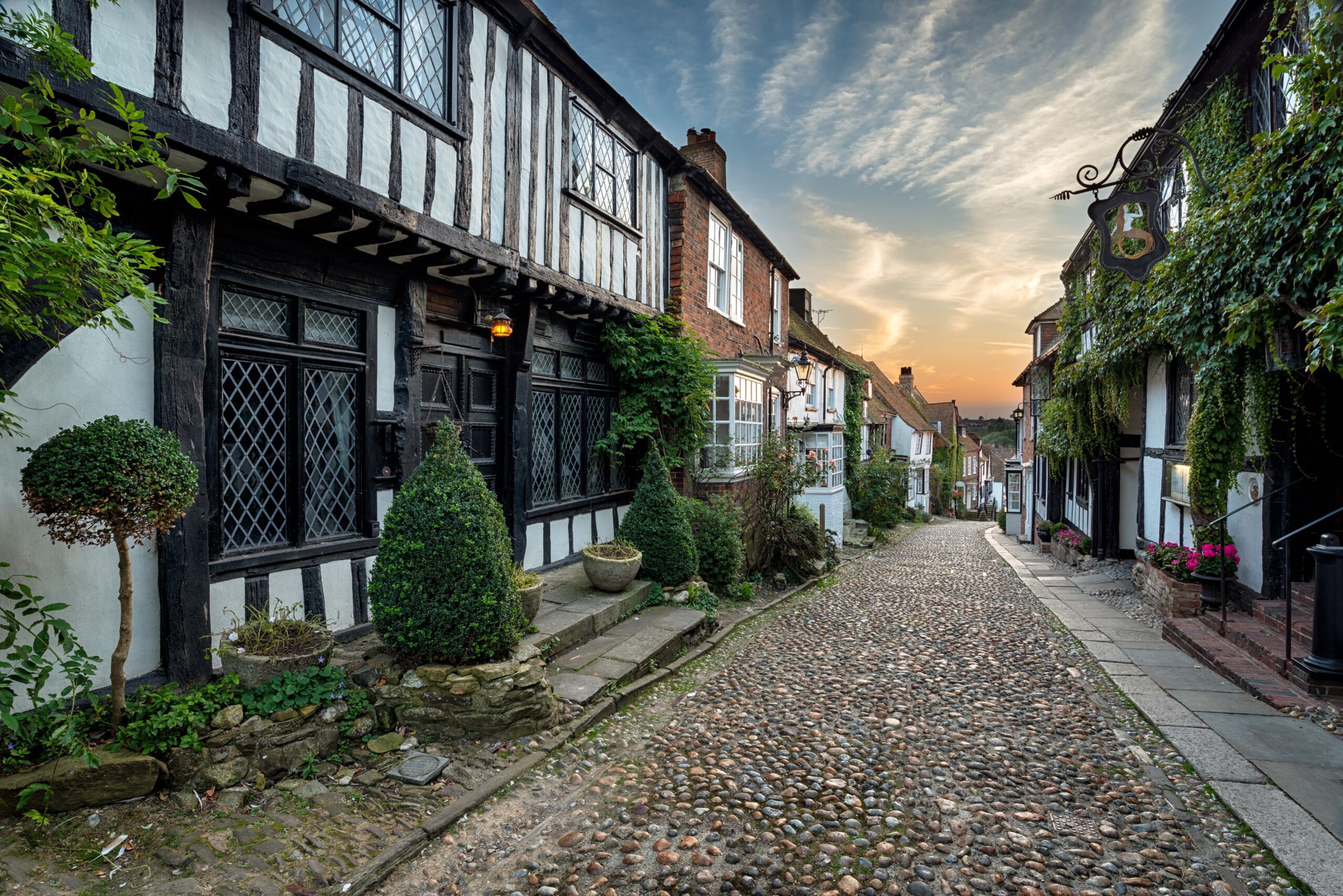 Beautiful tudor style half timbered houses lining a cobbled street in Rye, Sussex England