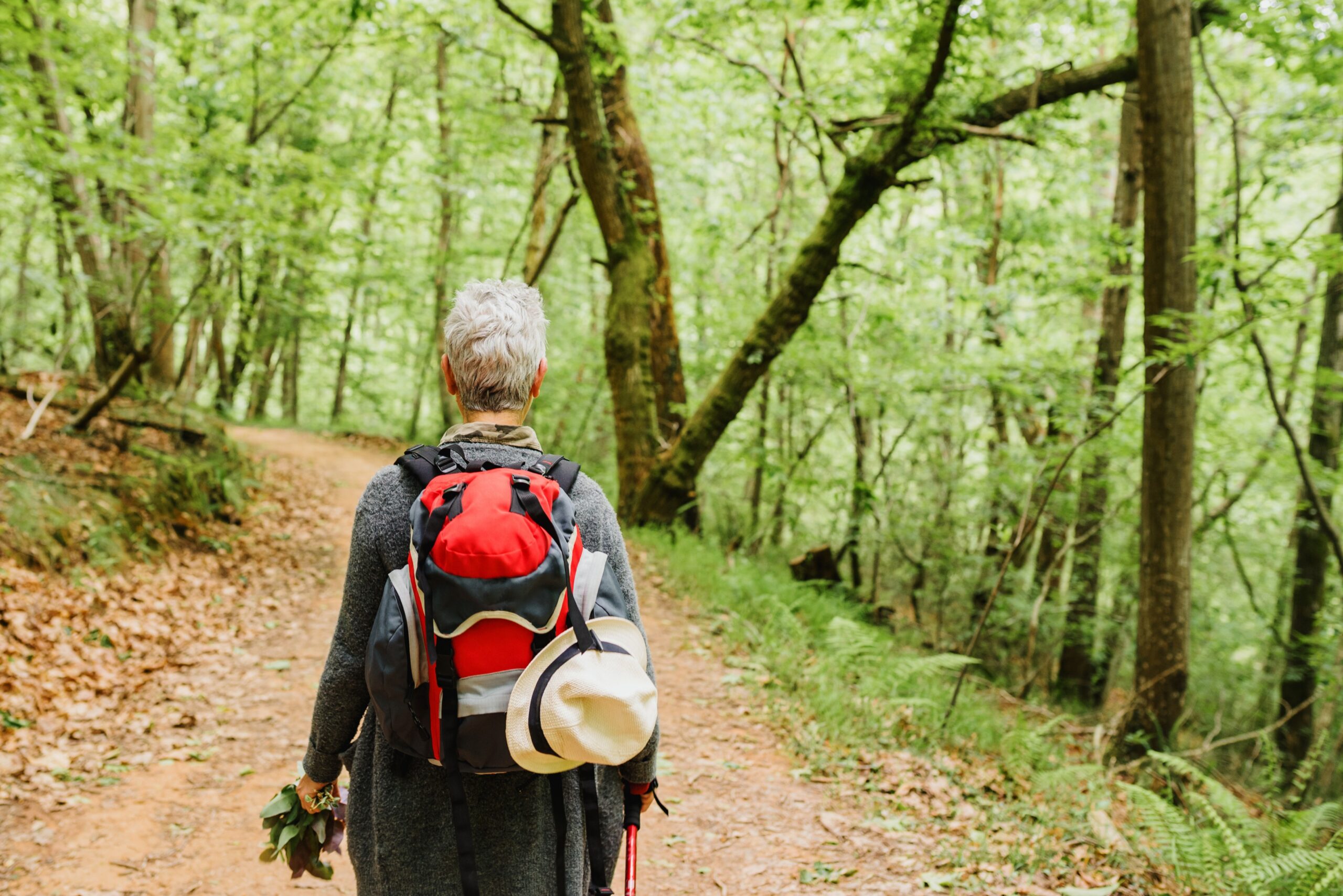 solo woman with recommended travel gear from women