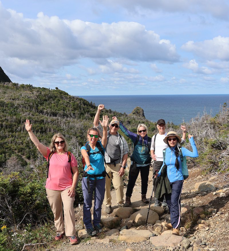 The hikers say cheers to forging ahead after the author, third from right, rebounds<br />
from a bunion<br />
issue on the Green Gardens Trail