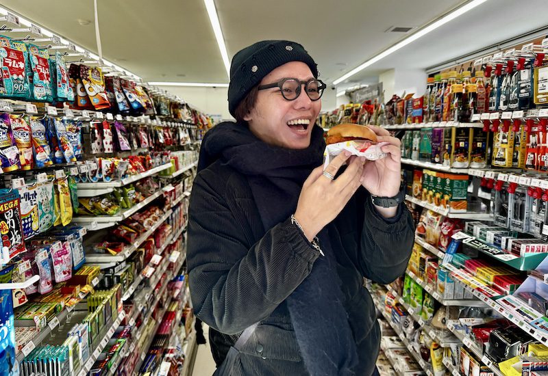 Arigato Travel tour guide Ronan Maynard Cancio in FamilyMart during a convenience store tour in Osaka