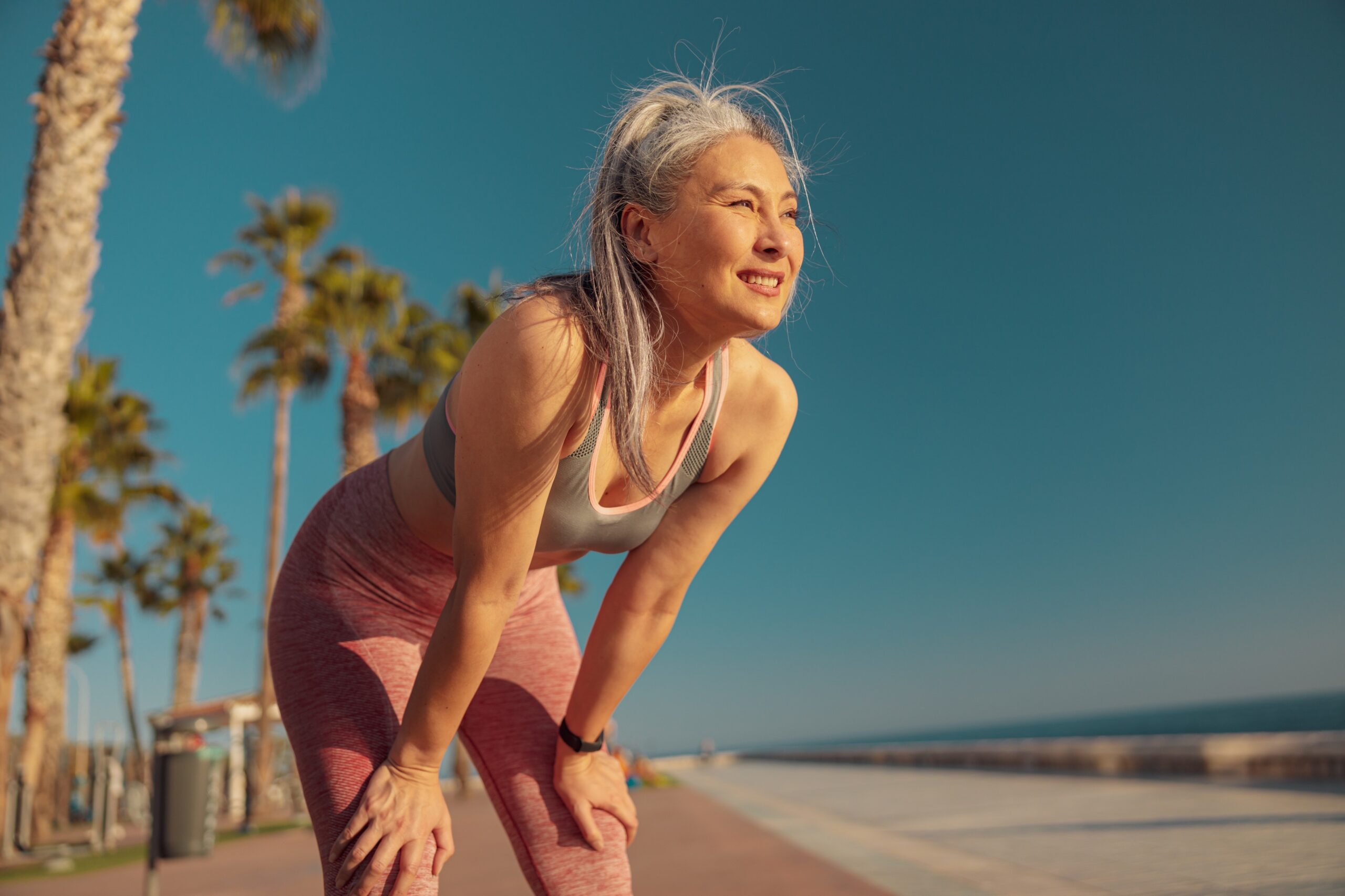 Older woman resting after yoga wellness travel