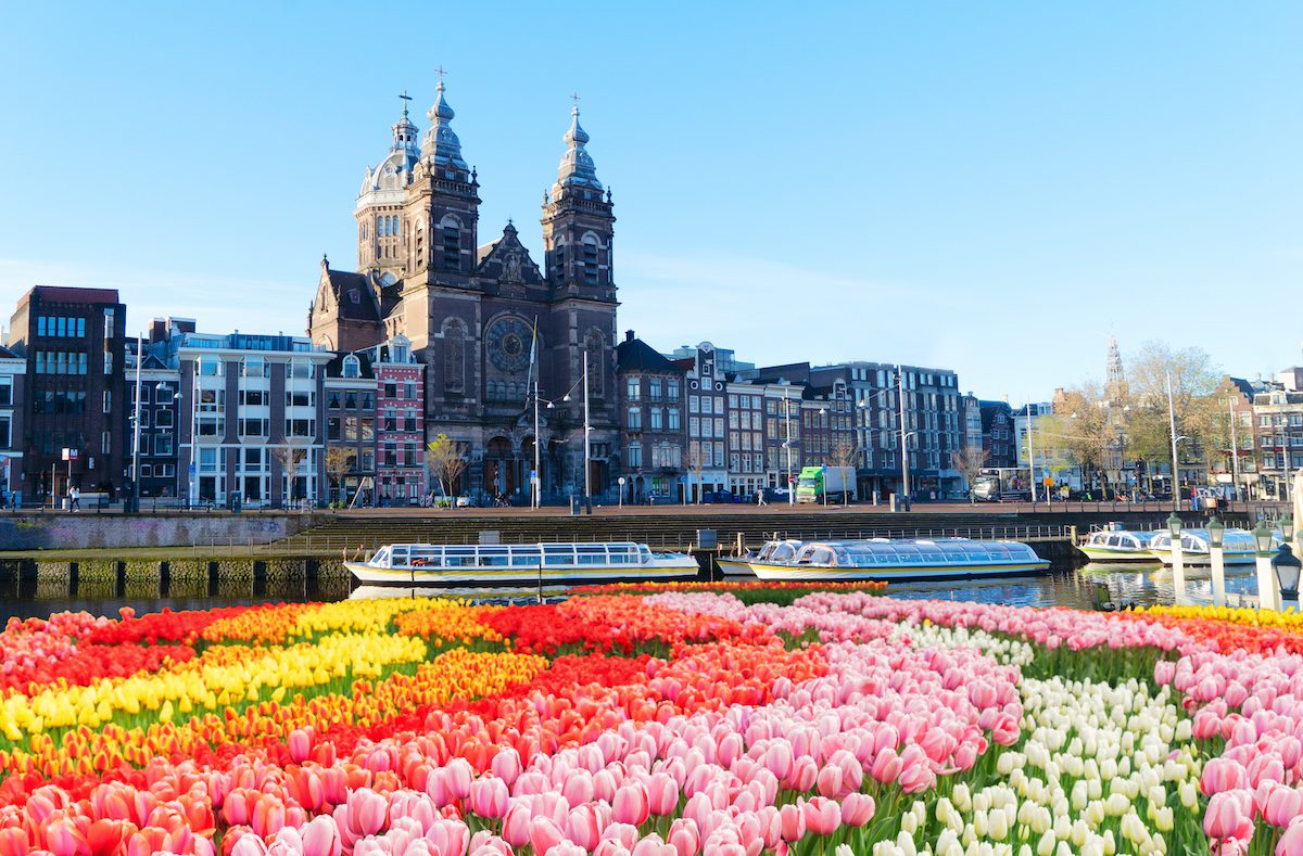 Church of St Nicholas over canal, Amsterdam, Holland at spring