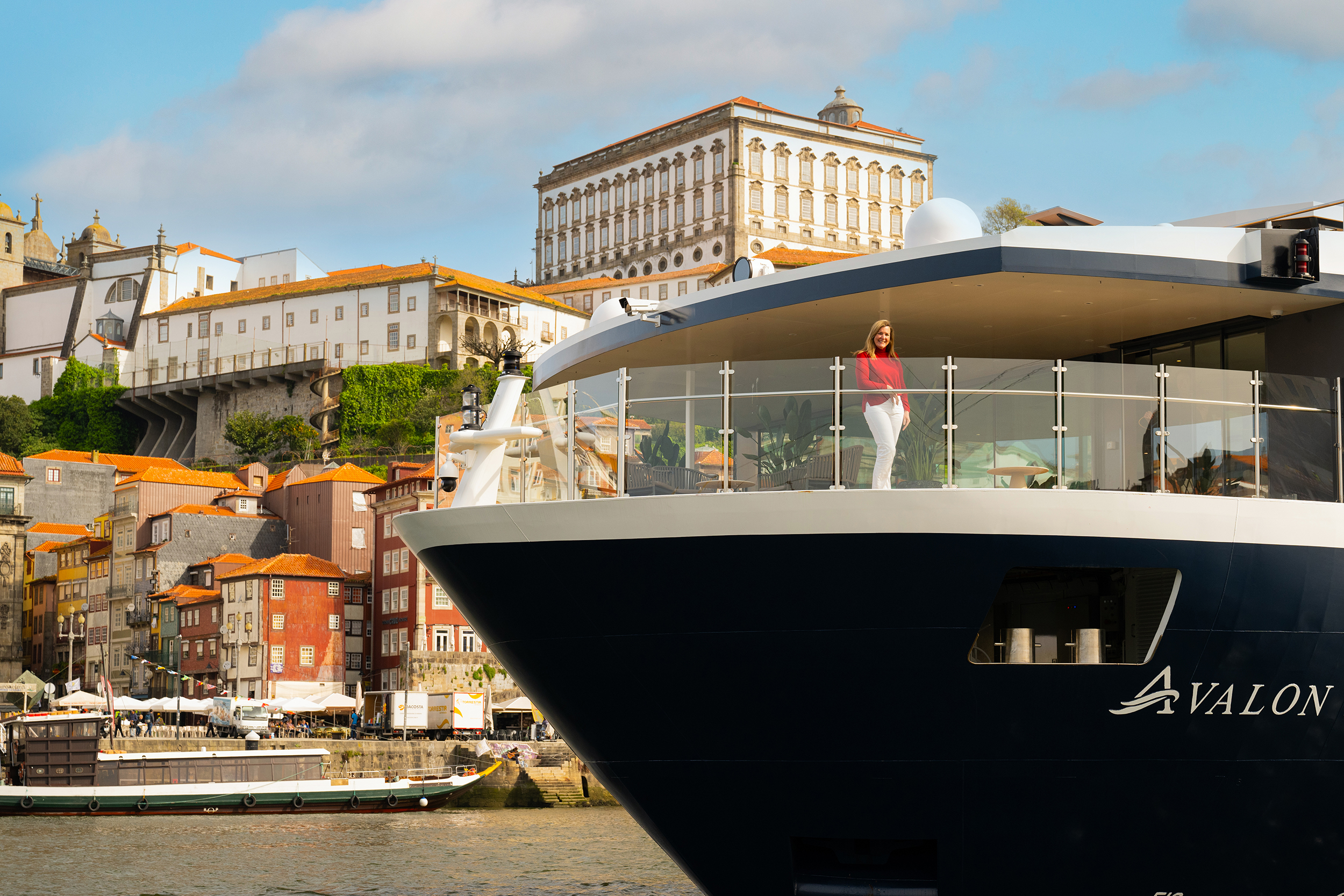 Avalon President Pam Hoffee standing on the bow of an avalon river cruise ship